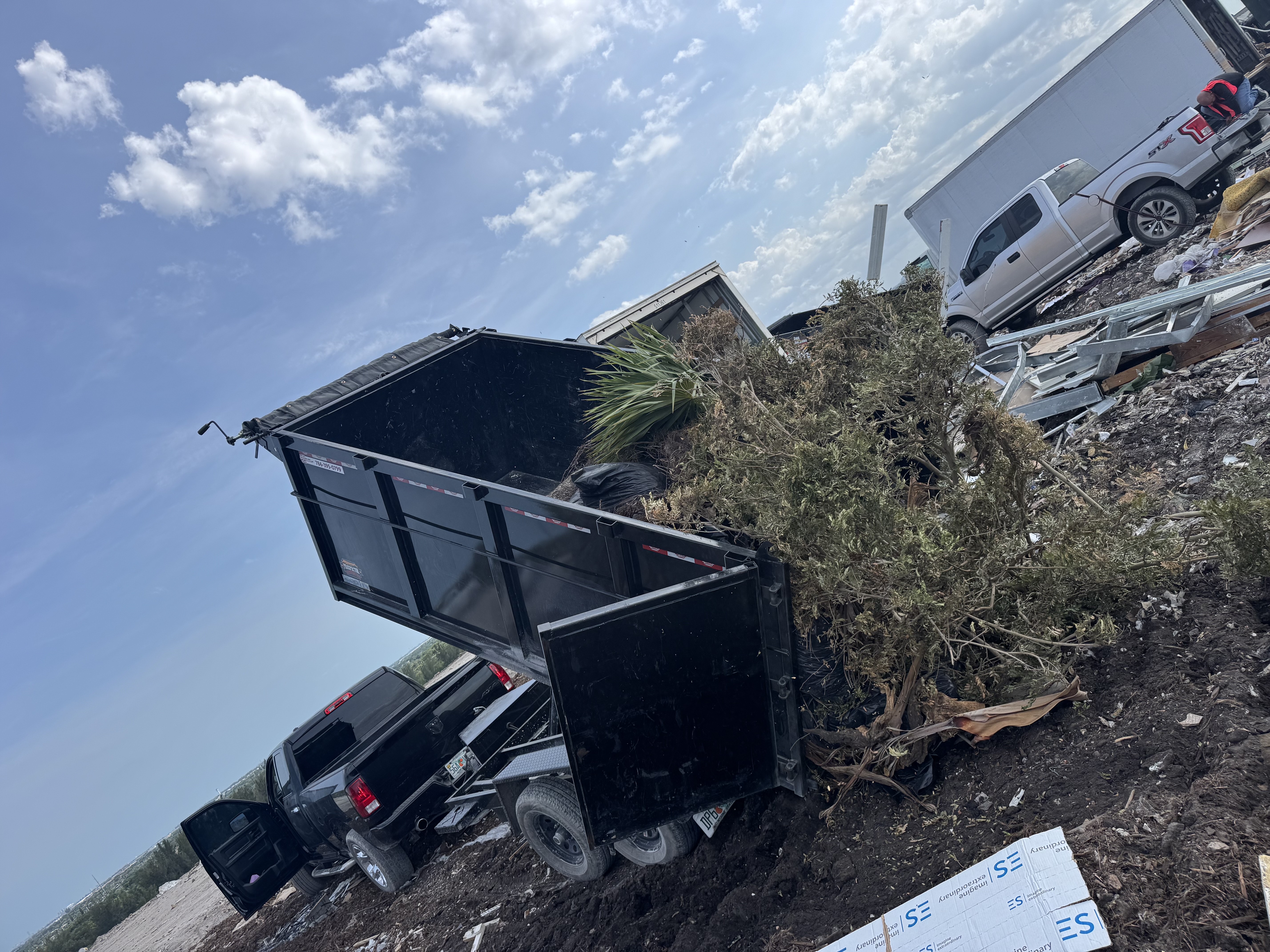 Dum Trailer service picks up debris and all types of garbage.