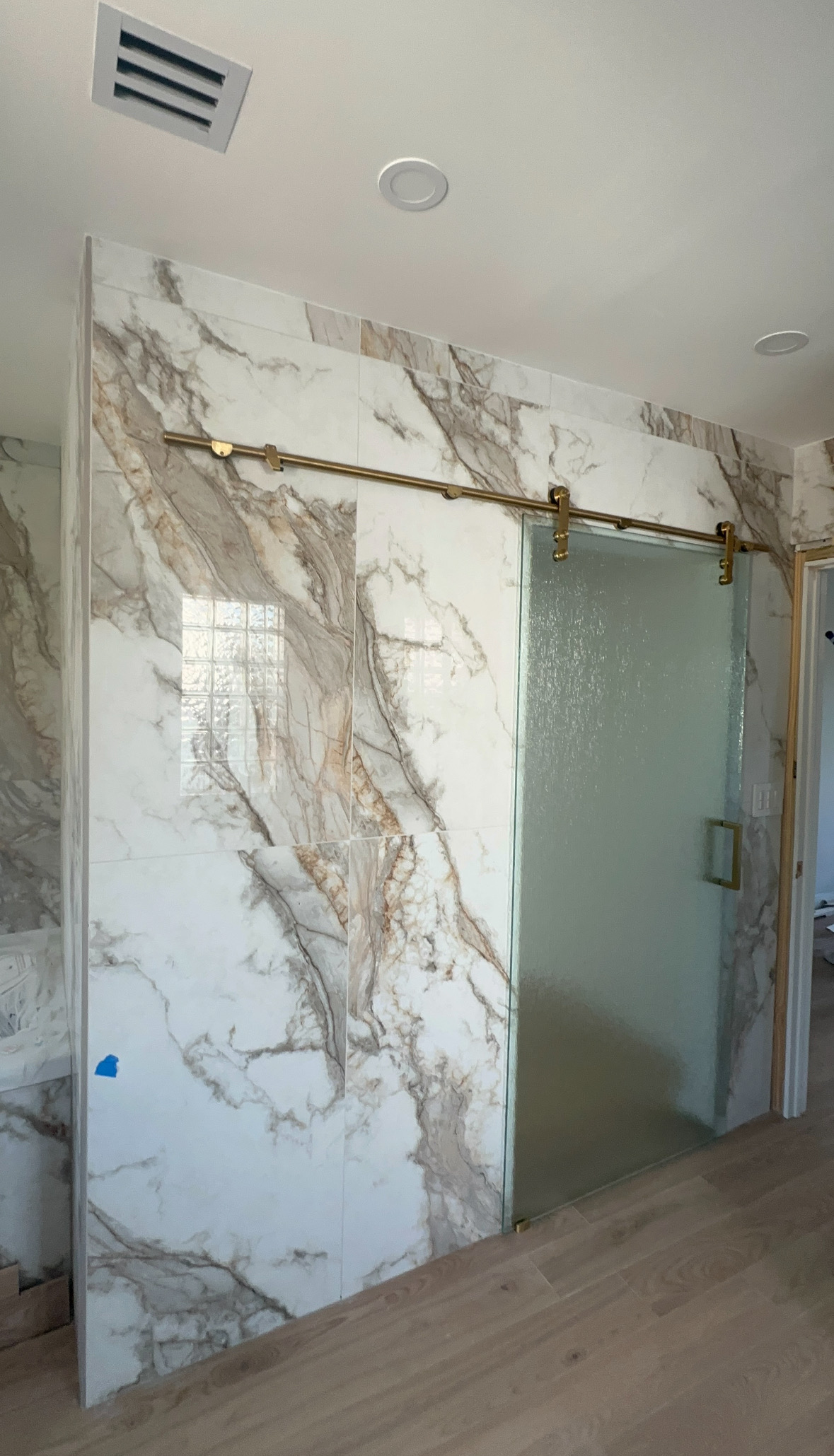 Image of glass shower door in Miami