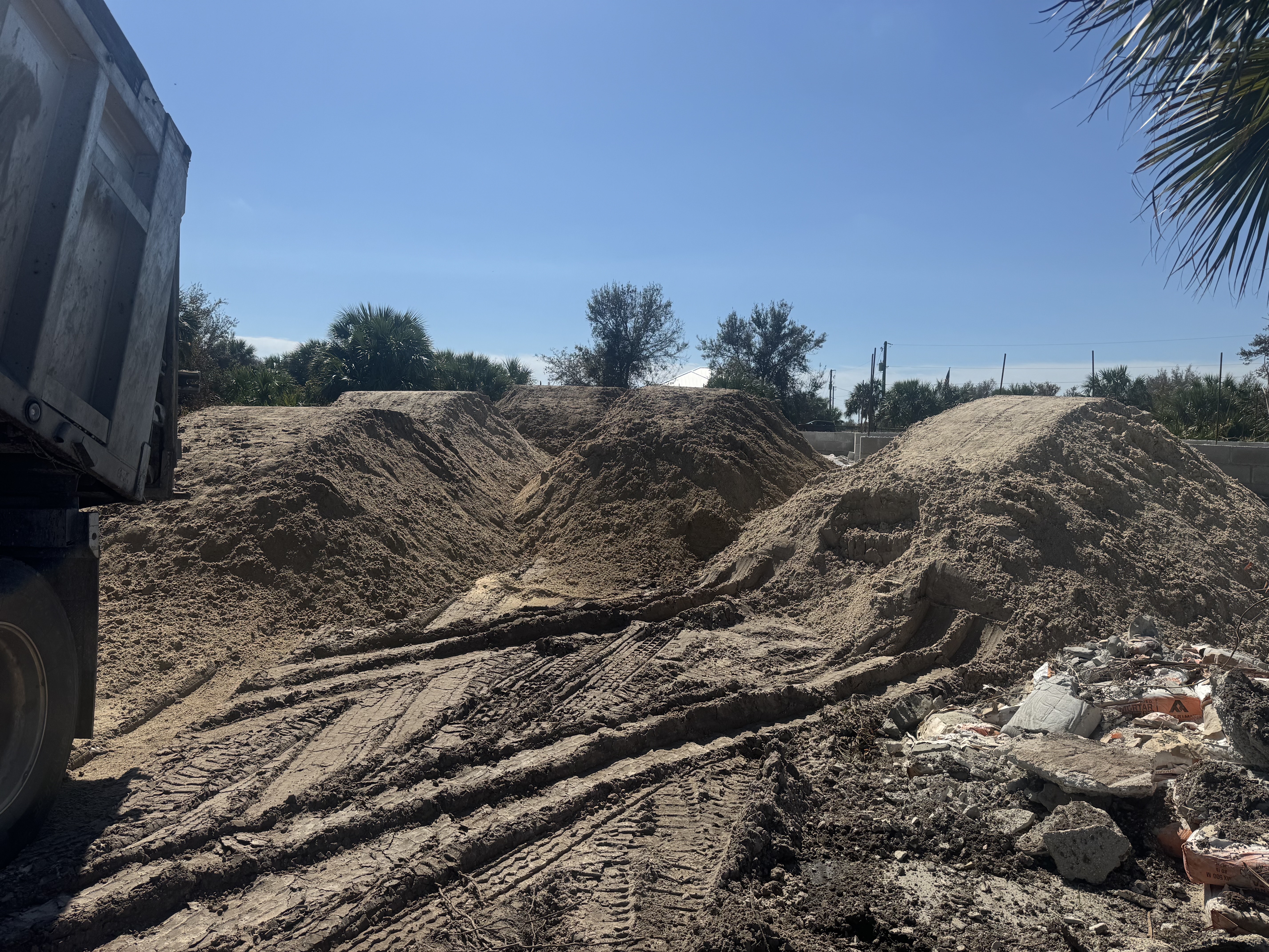 Image of land clearing and bring any material , skid steer in North Port